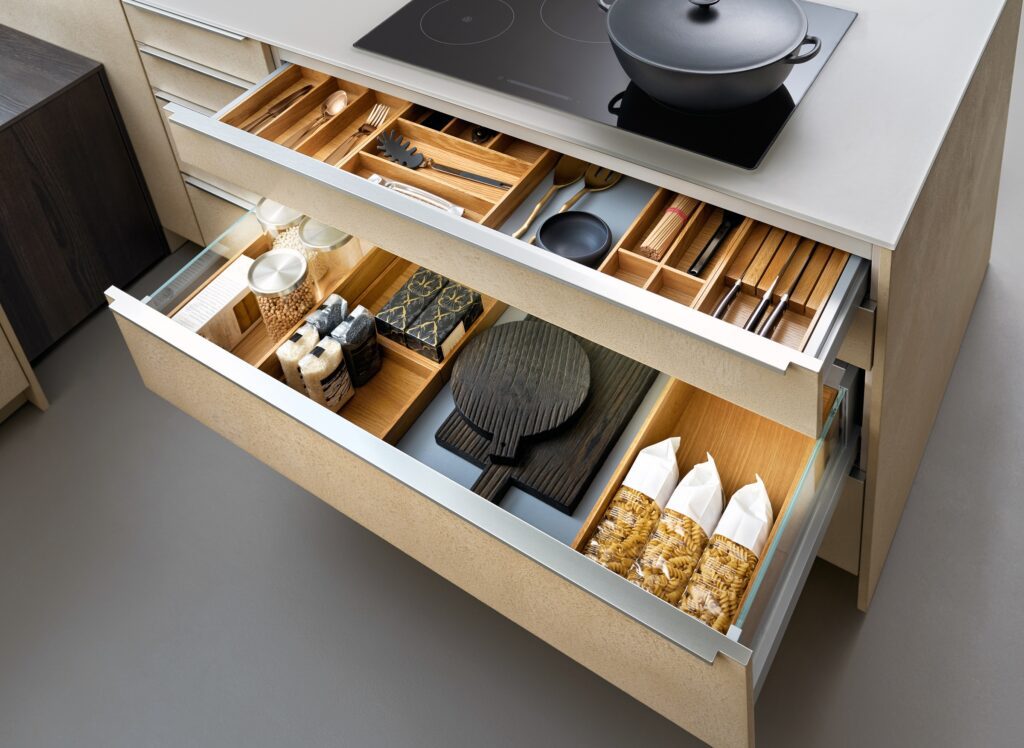 Modern kitchen, Open drawers, Set of cutlery trays in kitchen dr